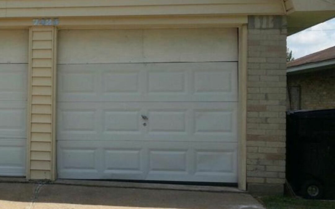 how to fix a dented garage door