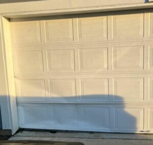 how to fix a dented garage door