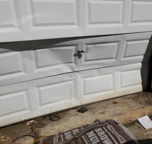 types of garage door panel damage 2